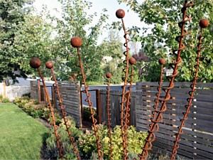 Fence and garden sculpture